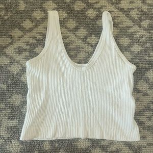 Urban Outfitters out from under tank in white